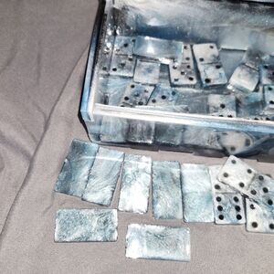 Dominoes in puzzle box